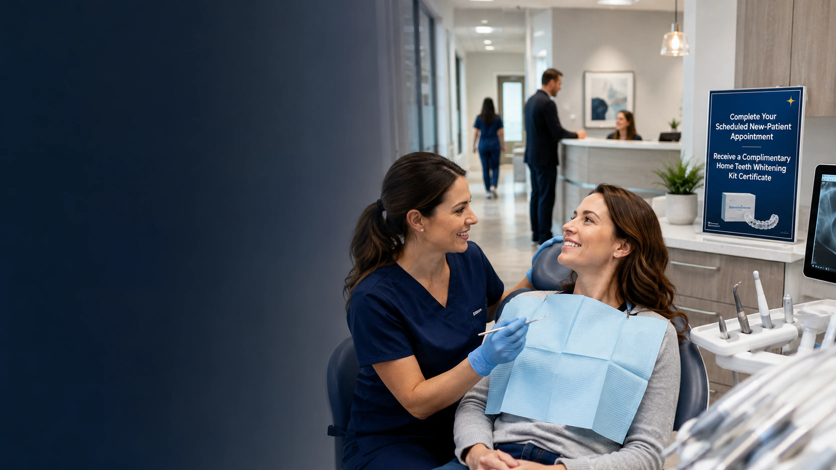 Dental professional greeting a new patient in a modern dental office beside an in-office sign offering a complimentary home teeth whitening kit certificate for completing a scheduled new-patient appointment